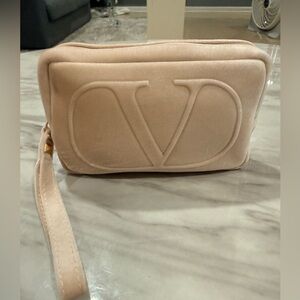 Valentino Blush Pink Embossed Logo Cosmetic wristlet